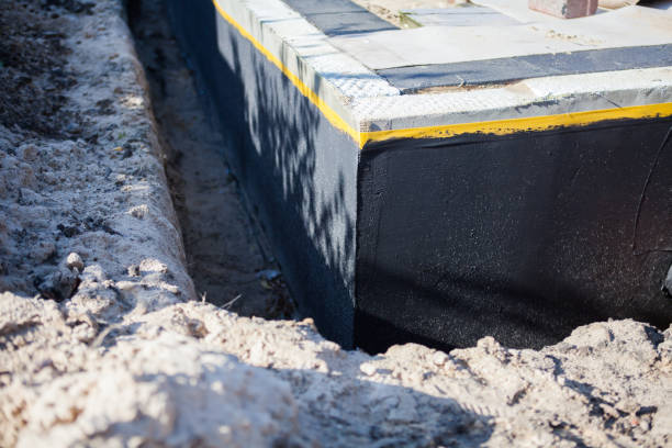 Professional Waterproofing technician working in Smiths Station, AL